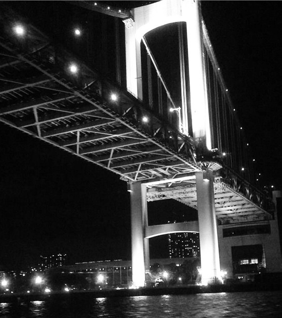 KASANE NIPPON gallery showcase: Monochrome industrial photography of a monumental steel bridge, capturing modern Japanese urban aesthetics.