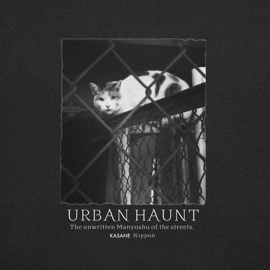 Monochrome nocturnal feline behind chain-link fence photography, urban wildlife shadow resident art, minimalist Japanese graphic design.